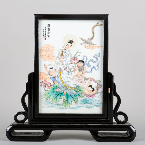 A CHINESE PORCELAIN FAMILLE ROSE TABLE SCREEN