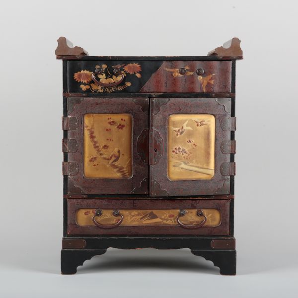A JAPANESE LACQUERED TABLE CABINET