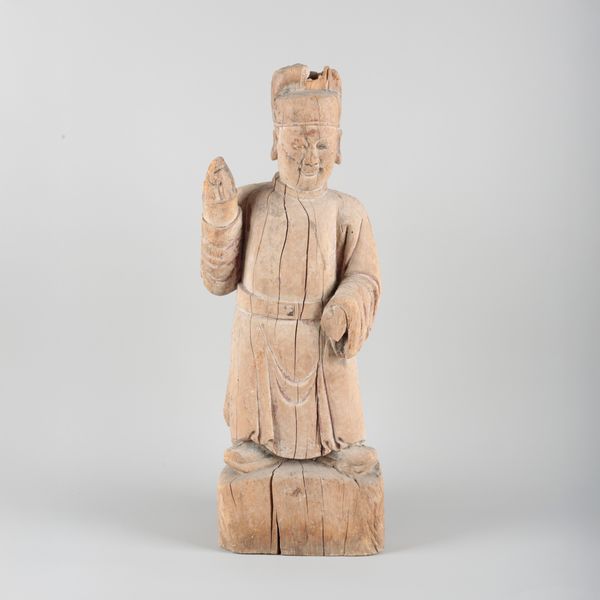 A CHINESE CARVED WOOD FIGURE OF AN OFFICIAL