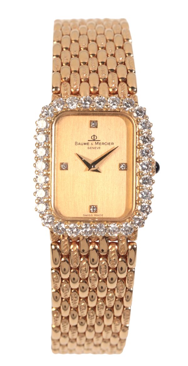 BAUME & MERCIER: A LADY'S 18CT GOLD BRACELET WATCH