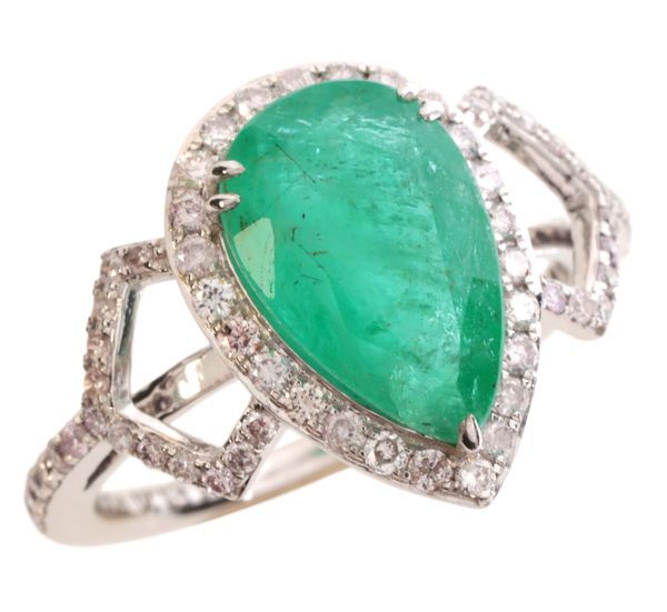 AN EMERALD AND DIAMOND RING