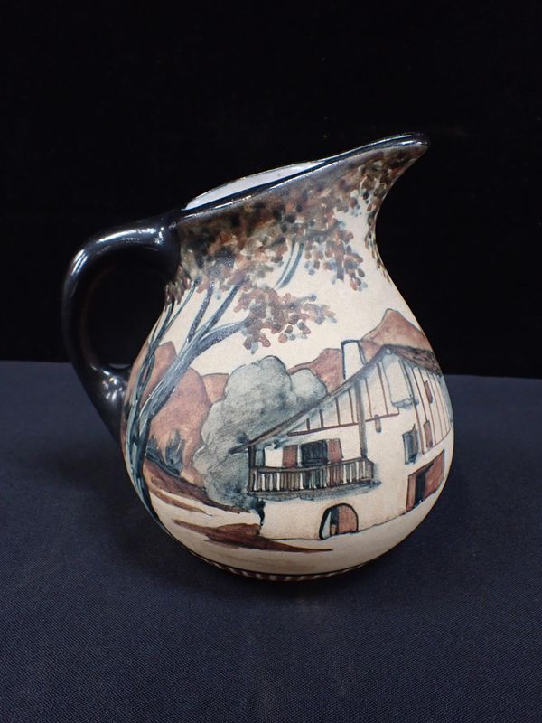 AN UNUSUAL FRENCH CIBOURE POTTERY JUG, SIGNED H. TOUTON