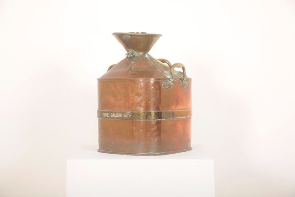 A COPPER AND BRASS 'CHEKPUMP' PETROL CAN