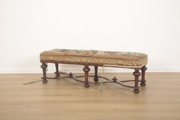 A LONG LOW STOOL IN WILLIAM AND MARY STYLE