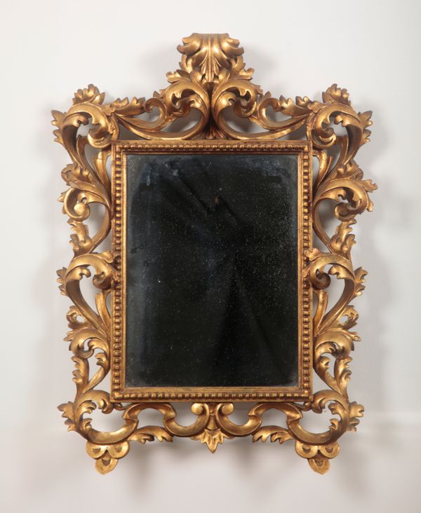 A GILTWOOD MIRROR OF FLORENTINE STYLE