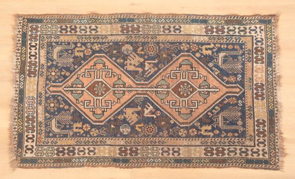 AN ANTIQUE QASHQAI OR KHAMSEH RUG