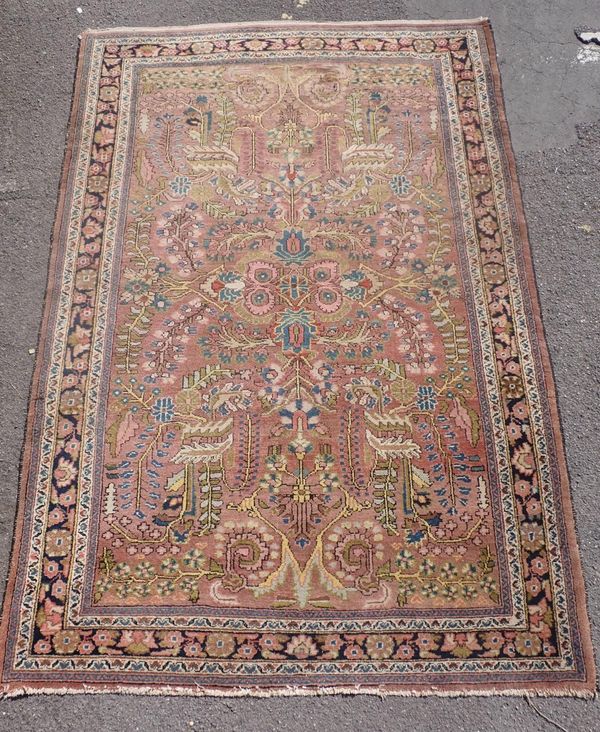 A HAMEDAN MADDER GROUND RUG