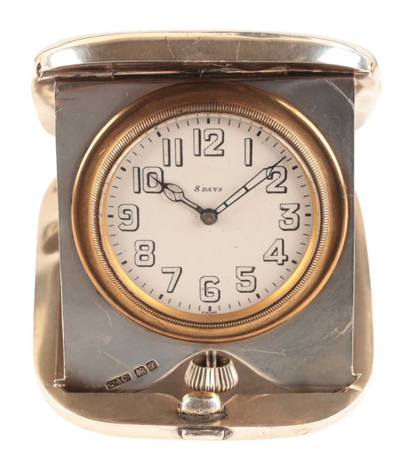 ROLEX: A SILVER CASED EIGHT DAY TRAVELLING CLOCK