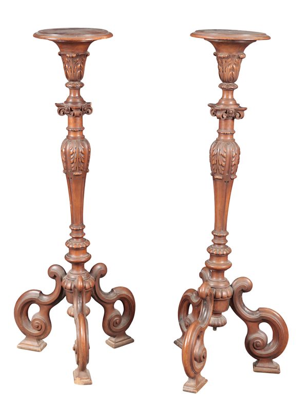 A PAIR OF MAHOGANY TORCHERES