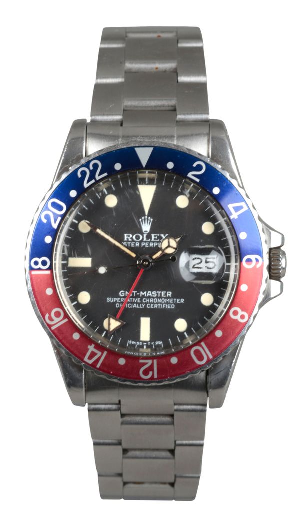 ROLEX GMT MASTER OYSTER PERPETUAL: A STAINLESS STEEL BRACELET WATCH