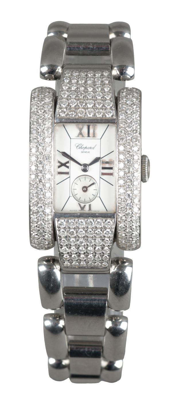 CHOPARD LA STRADA: A STAINLESS STEEL AND DIAMOND ENCRUSTED BRACELET WATCH
