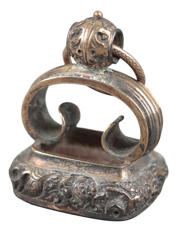 A LATE VICTORIAN GILT METAL FOB
