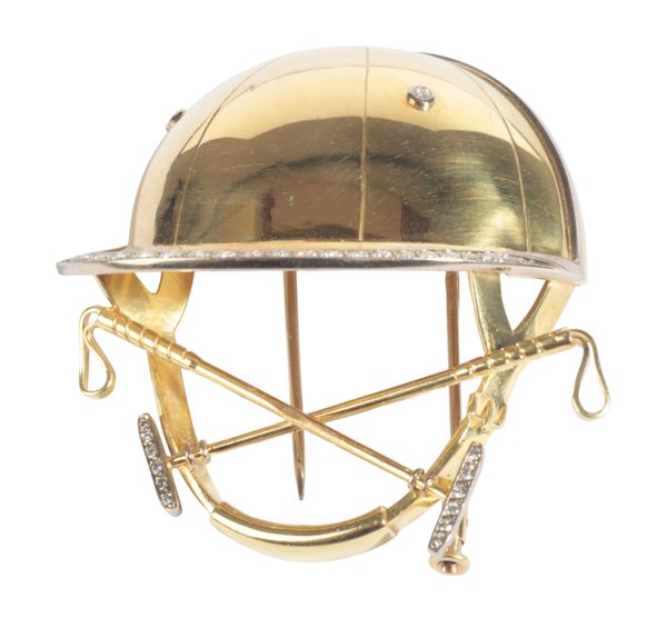 A DIAMOND POLO HELMET BROOCH