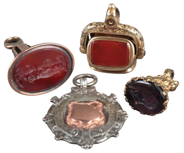 THREE GOLD-PLATED FOBS