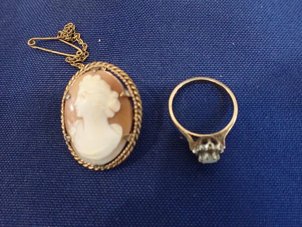 AN OPAL AND DIAMOND CLUSTER RING AND CAMEO BROOCH