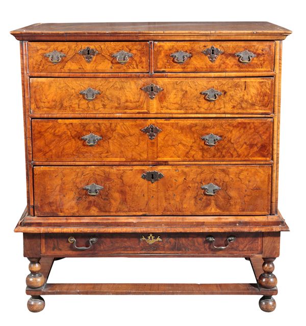 A QUEEN ANNE WALNUT CHEST ON STAND