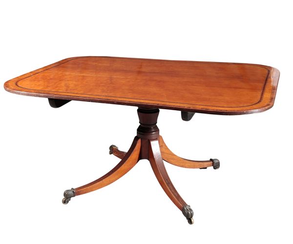A REGENCY WALNUT BREAKFAST TABLE