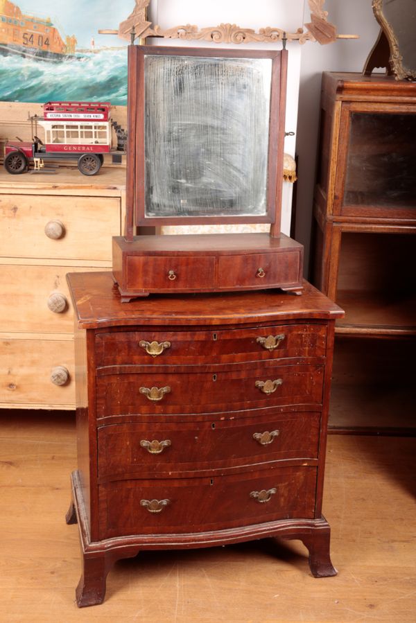 A FIGURED AND CROSS BANDED MAHOGANY SERPENTINE FRONTED CHEST OF DRAWERS