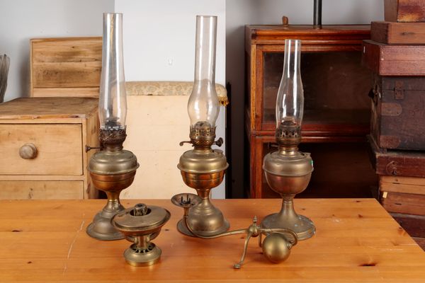 A LATE VICTORIAN ARTS & CRAFTS BRASS CANDLESTICK IN THE MANNER OF W.A.S. BENSON