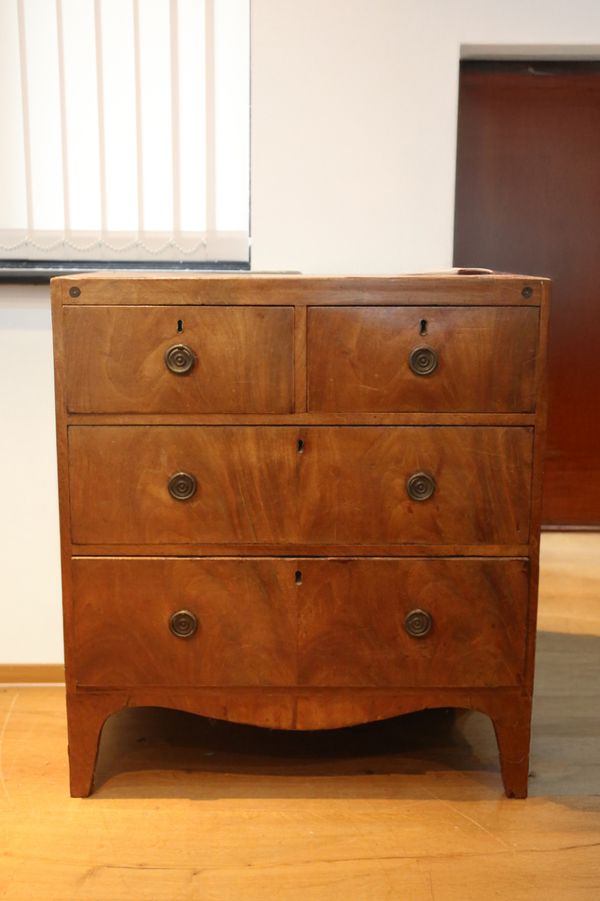 A REGENCY MAHOGANY CHEST OF DRAWERS