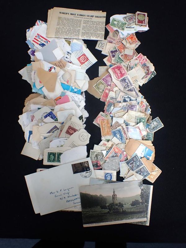 A QUANTITY OF WORLD STAMPS