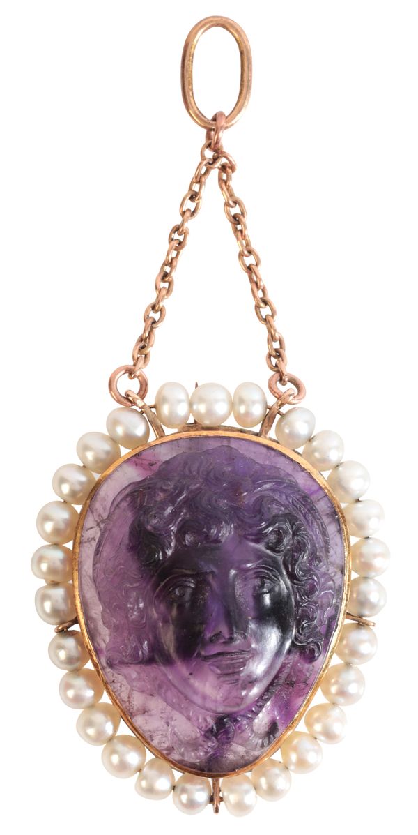 AN ANTIQUE CARVED AMETHYST CAMEO AND PEARL BROOCH / PENDANT