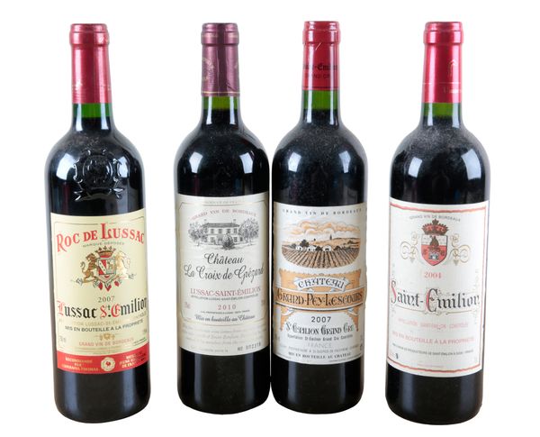 FOUR BOTTLES OF VINTAGE ST. EMILION