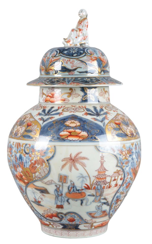 A CONTINENTAL PORCELAIN BALUSTER VASE AND COVER