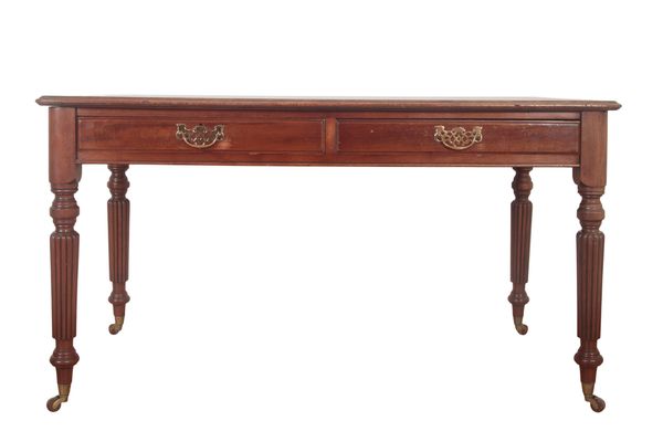 AN EARLY VICTORIAN MAHOGANY WRITING TABLE