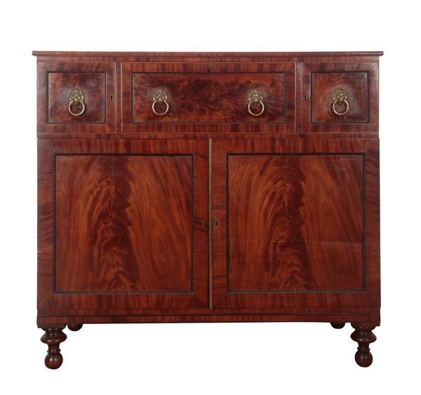 A GEORGE IV FIGURED MAHOGANY SECRETAIRE CHEST