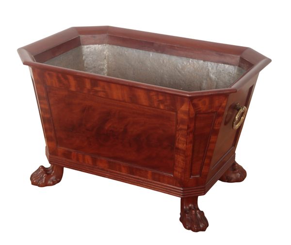 A REGENCY STYLE FIGURED MAHOGANY CELLARETTE