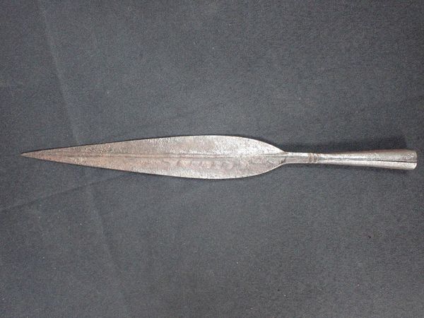 AN ANTIQUE AFRICAN IRON SPEAR