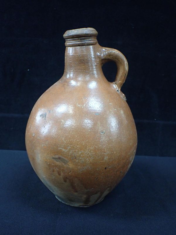 AN ENGLISH STONEWARE BELLARMINE TYPE FLASK OR BOTTLE