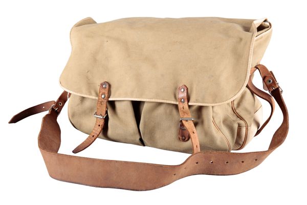 A VINTAGE CANVAS AND LEATHER FISHING BAG