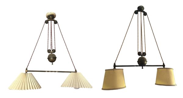 A PAIR OF BRASS 'RISE AND FALL' TWIN CEILING LIGHTS