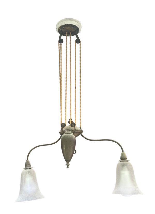 A BRASS 'RISE AND FALL' CEILING LIGHT