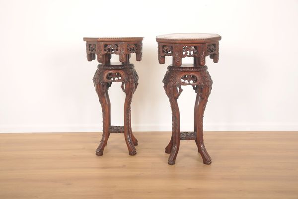 A PAIR OF CHINESE HARDWOOD JARDINIÈRE STANDS