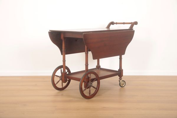 A MAHOGANY TEA TROLLEY BY BEVAN FUNNELL