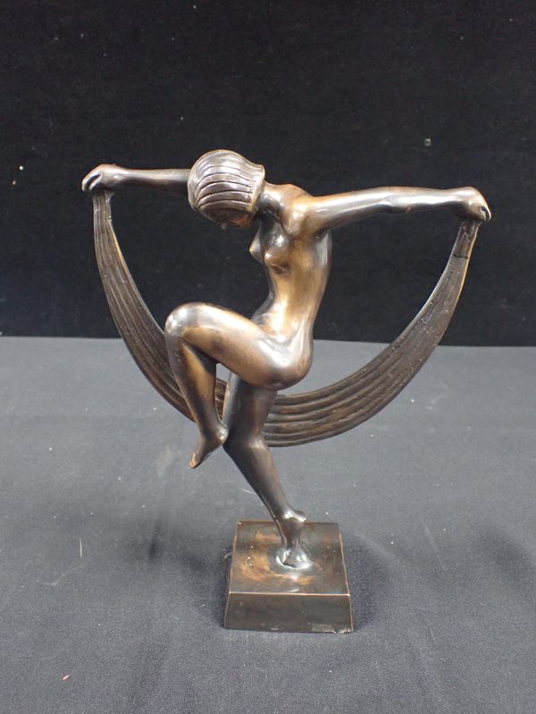 A BRONZE ART DECO STYLE FIGURE