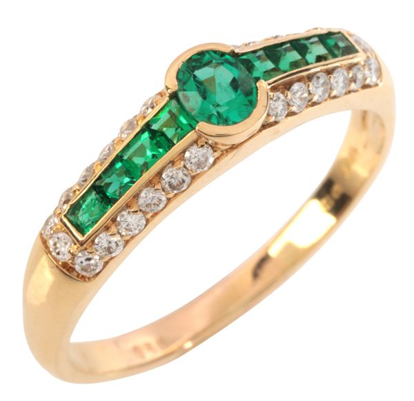 AN EMERALD AND DIAMOND RING