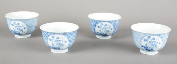 A GROUP OF FOUR CHINESE BLUE AND WHITE BOWLS