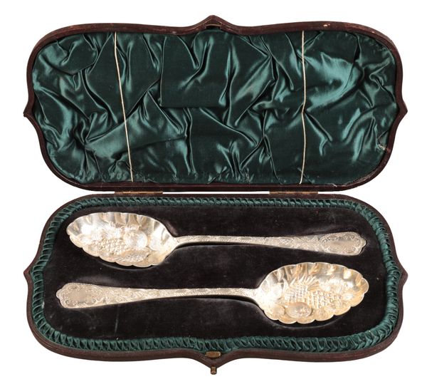 A PAIR OF LATE VICTORIAN SILVER 'BERRY' SPOONS