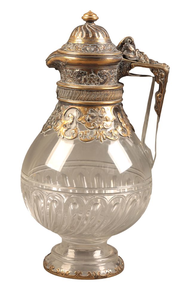 A VICTORIAN SILVER GILT MOUNTED CUT GLASS CLARET JUG