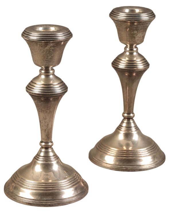 A PAIR OF ELIZABETH II SILVER CANDLESTCKS