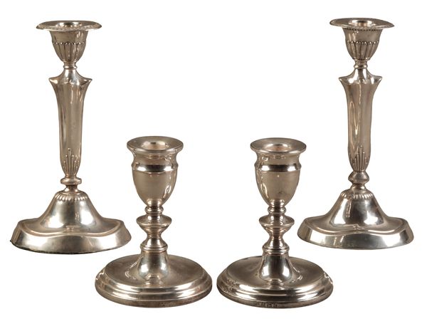 A PAIR OF EDWARD VII SILVER CANDLESTICKS