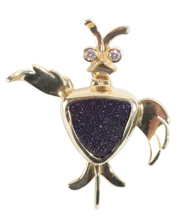 A GEM-SET BIRD BROOCH