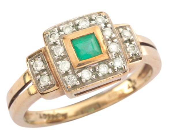 AN EMERALD AND DIAMOND DRESS RING
