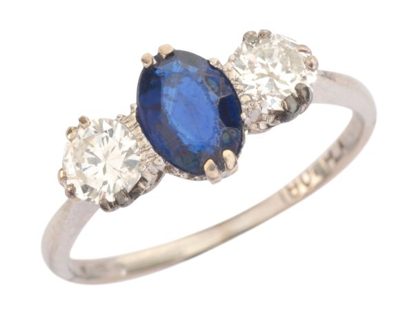 A SAPPHIRE AND DIAMOND THREE STONE RING