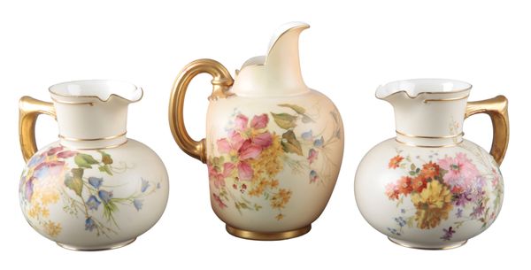 A GROUP OF THREE ROYAL WORCESTER BLUSH IVORY JUGS