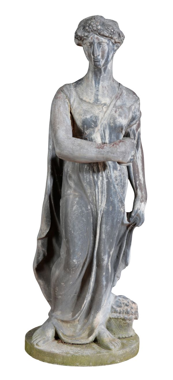 AN EDWARDIAN LEAD GARDEN FIGURE OF THE GODDESS CLIO, THE MUSE OF HISTORY